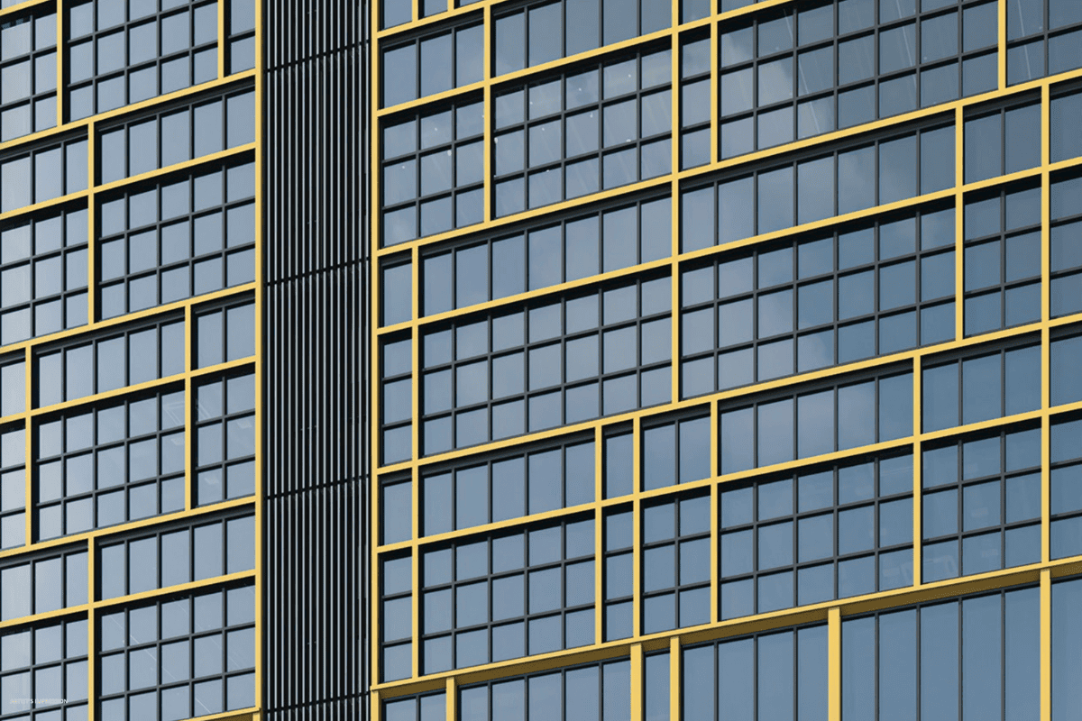 CT Gold @ Macpherson gold-trimmed facade detail showing premium architectural finish and window glazing